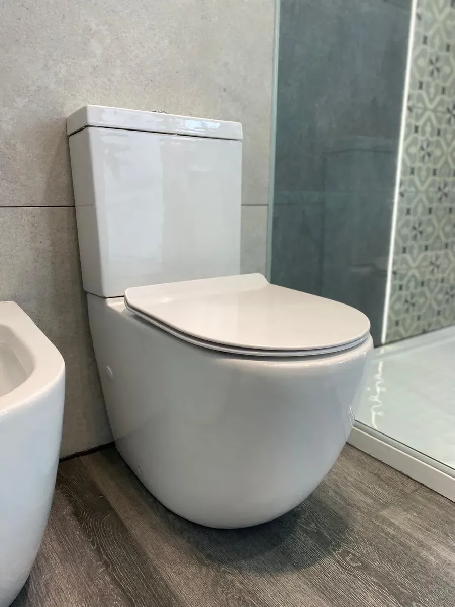 Juego de baño peirano stone blanco inodoro asiento deposito y bidet - Image 4